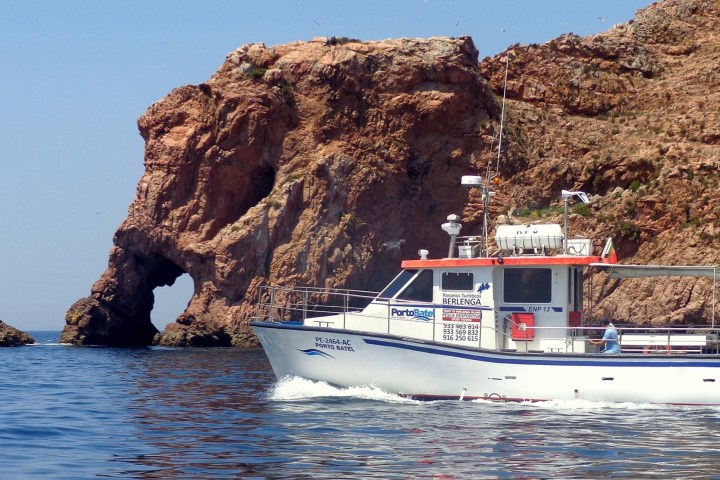 a boat sitting on top of a mountain
